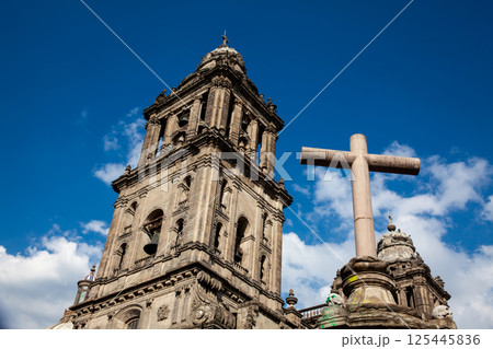 Facade of the historical Metropolitan Cathedral of Mexico City built between 1573 and 1813. Metropolitan Cathedral of the Assumption of the Most Blessed Virgin Mary into Heaven. 125445836