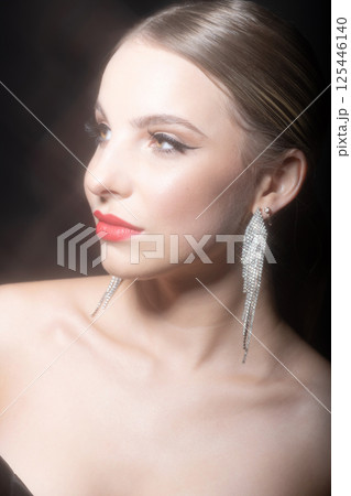 Beautiful woman classic studio portrait 125446140