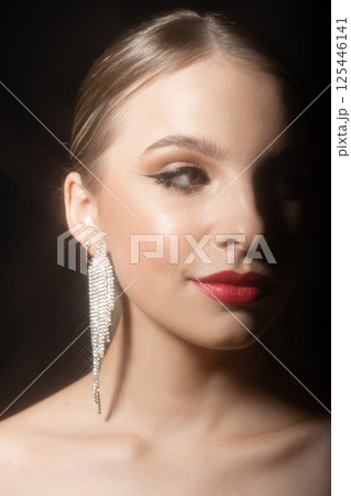 Beautiful woman classic studio portrait 125446141