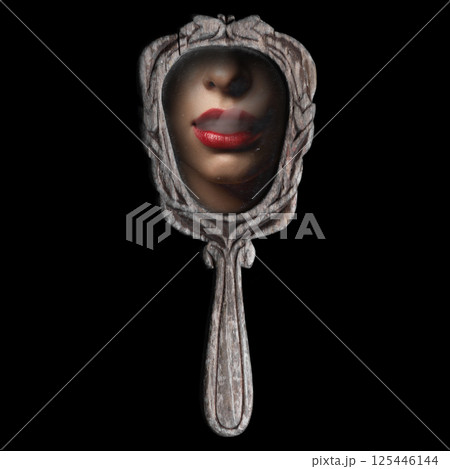 Retro vintage hand mirror and woman face with smoke Retro vintage hand mirror and woman face with smoke 125446144