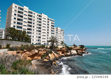 Modern, multi-story white apartment Modern, multi-story white apartment 125446149