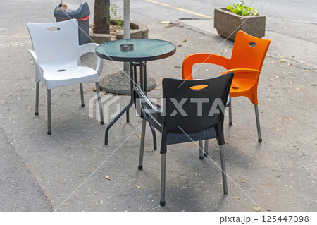 Table Chairs at Street 125447098