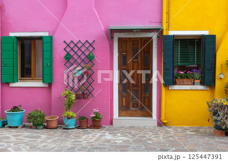 Colorful house facade with flowers in Burano Colorful house facade with flowers in Burano 125447391