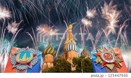 Cathedral of Intercession of Most Holy Theotokos on the Moat (Temple of Basil the Blessed) with orders of victory, and fireworks in honor of Victory Day celebration (WWII), Red Square, Moscow, Russia 125447930