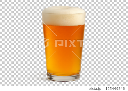 Craft Beer Served in a Clear Glass With Frothy Head Sitting on a Table During a Sunny Afternoon 125449246