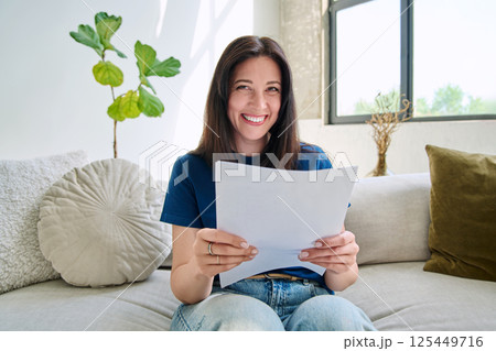 Webcam view young smiling woman with business papers having video Webcam view young smiling woman with business papers having video 125449716