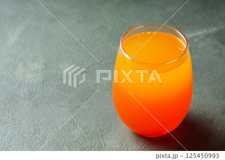 Dirty Soda in Transparent Glass on Green Background, Trendy Carbonated Drink Concept, Copy Space Dirty Soda in Transparent Glass on Green Background, Trendy Carbonated Drink Concept, Copy Space 125450993