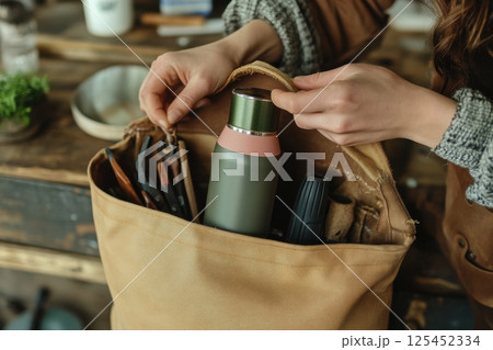 Packing essentials for outdoor adventures nature lifestyle cozy environment close-up preparation 125452334