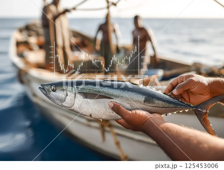 海産物売り上げチャートと魚を見せる漁師のイメージ素材 125453006