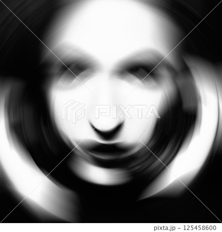 Close-up black and white woman portrait in radial blur effect style 125458600