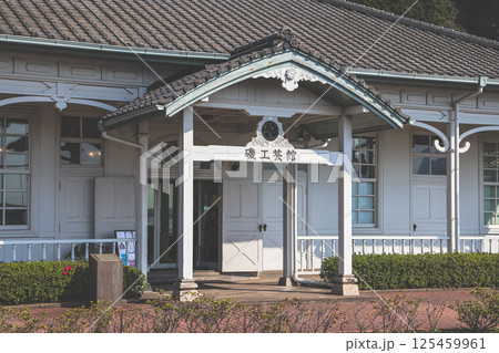 March 23 2025 Traditional Japanese Building Surrounded by Green Hills , Japan March 23 2025 Traditional Japanese Building Surrounded by Green Hills , Japan 125459961