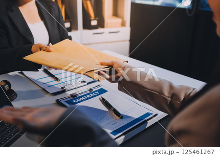 Concept of legal counseling. The lawyer or legal counsel is listening and providing advice to business people. 125461267