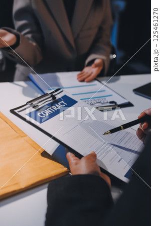 Concept of legal counseling. The lawyer or legal counsel is listening and providing advice to business people. Concept of legal counseling. The lawyer or legal counsel is listening and providing advice to business people. 125461270