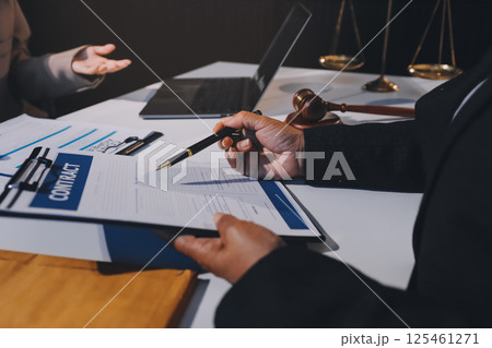Concept of legal counseling. The lawyer or legal counsel is listening and providing advice to business people. Concept of legal counseling. The lawyer or legal counsel is listening and providing advice to business people. 125461271