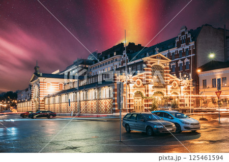 Helsinki, Finland. Old Market Hall Vanha Kauppahalli In City Center In Lighting At Evening Or Night Illumination. Famous Popular Place. Night stars shining above street Helsinki, Finland. Old Market Hall Vanha Kauppahalli In City Center In Lighting At Evening Or Night Illumination. Famous Popular Place. Night stars shining above street 125461594