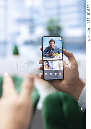 General manager addressing corporate social responsibility on internet call, discussing about the importance of ethical practices and sustainability. Advisory board briefing meeting. 125461976