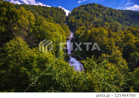 Giessbach Waterfalls Flowing Through Forest Near Lake Brienz, Switzerland 125464760