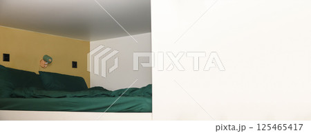 Modern loft bunk bed in white, smart space design with green lamp, wall accents, and ample copy space. Smart design concept 125465417