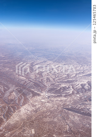 Mountain Ranges and Shanxi Province in China airplane view. Inner Mongolia mountain landscape of Mount Tangula Mountain Ranges and Shanxi Province in China airplane view. Inner Mongolia mountain landscape of Mount Tangula 125465783