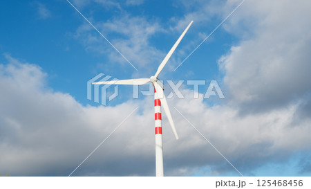 Red And White Wind Turbine In Action Red And White Wind Turbine In Action 125468456