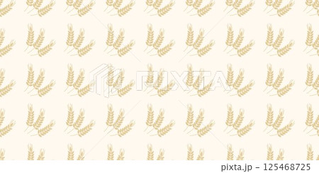 Ripe ears of grain on light beige background Ripe ears of grain on light beige background 125468725