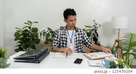 Business analysis with charts and graphs in modern office 125470104