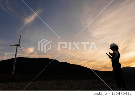 A young woman in red holds a beautifully decorated gift package, ready to surprise her loved ones on a special birthday. Isolate on white background. High quality photo A young woman in red holds a beautifully decorated gift package, ready to surprise her loved ones on a special birthday. Isolate on white background. High quality photo 125470413