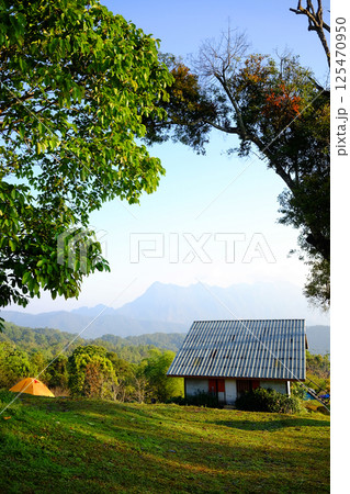 Homestay with accommodation and camping area on green lawn field on the mountain with valley Doi Luang Chiang Dao mountain view, Chiang Mai Province of Thailand Homestay with accommodation and camping area on green lawn field on the mountain with valley Doi Luang Chiang Dao mountain view, Chiang Mai Province of Thailand 125470950