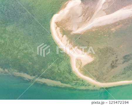 Aerial view of sandbar with turquoise sea at Laem had Koh khao yai Phang Nga Thailand, summer background and summer holiday concept Aerial view of sandbar with turquoise sea at Laem had Koh khao yai Phang Nga Thailand, summer background and summer holiday concept 125472194