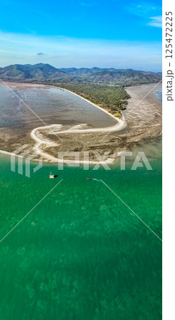 Aerial view of sandbar with turquoise sea at Laem had Koh khao yai Phang Nga Thailand, summer background and summer holiday concept Aerial view of sandbar with turquoise sea at Laem had Koh khao yai Phang Nga Thailand, summer background and summer holiday concept 125472225