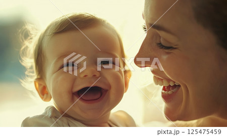 Outdoor Laughter Between Mother and Baby 125475459