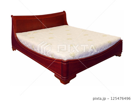 Empty double bed isolated Empty double bed isolated 125476496