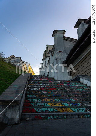 Mosaic steps, bottom-up view, old town. Evening City sunset Mosaic steps, bottom-up view, old town. Evening City sunset 125476974