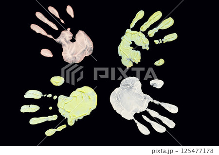 Colorful handprints on black background, featuring textured paint patterns. Abstract creative art concept Colorful handprints on black background, featuring textured paint patterns. Abstract creative art concept 125477178