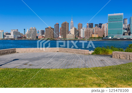 Manhattan New York sunny skyline East River NYC 125478100