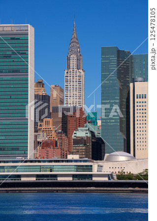 Manhattan New York sunny skyline East River NYC 125478105
