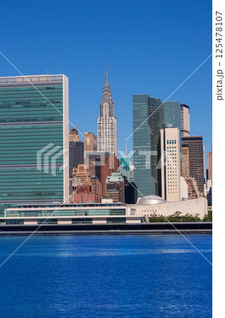 Manhattan New York sunny skyline East River NYC 125478107