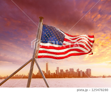 Manhattan skyline New York with American flag US Manhattan skyline New York with American flag US 125478280