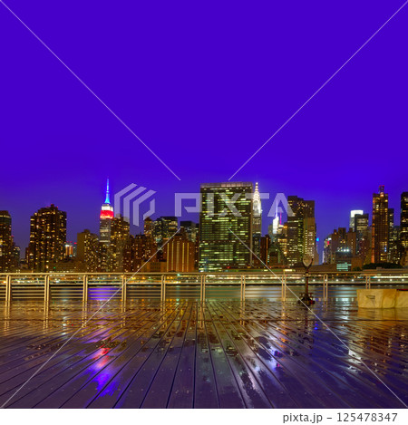 Manhattan New York sunset skyline from East 125478347