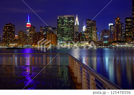 Manhattan New York sunset skyline from East Manhattan New York sunset skyline from East 125478356