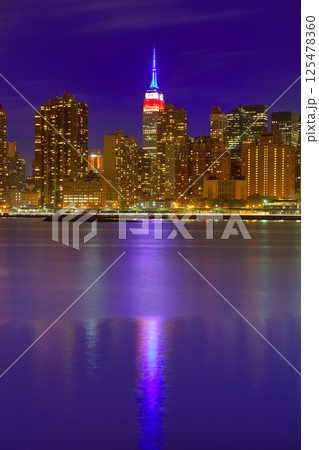 Manhattan New York sunset skyline from East 125478360