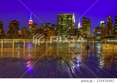 Manhattan New York sunset skyline from East 125478361