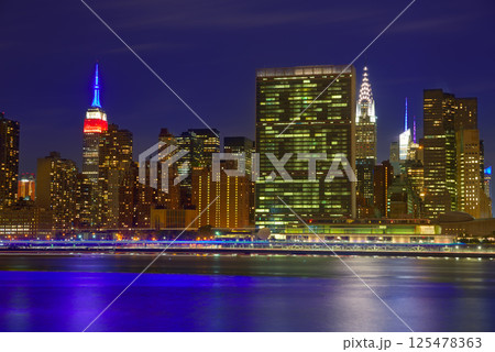 Manhattan New York sunset skyline from East 125478363