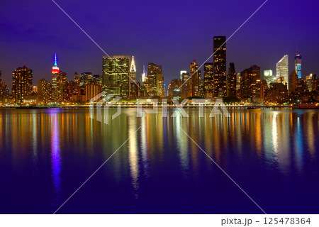 Manhattan New York sunset skyline from East 125478364