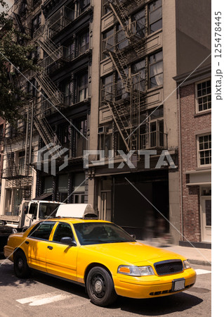 New York Soho buildings yellow cab taxi NYC USA 125478445