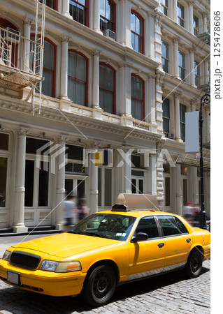 New York Soho buildings yellow cab taxi NYC USA 125478606