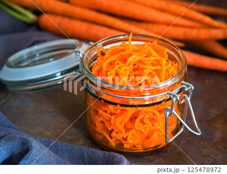 Healthy organic carrot salad in jar. 125478972