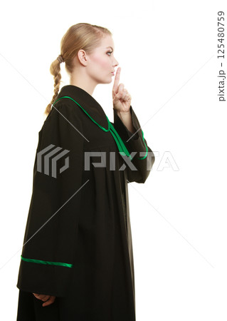 Womn lawyer attorney finger on lips. Womn lawyer attorney finger on lips. 125480759