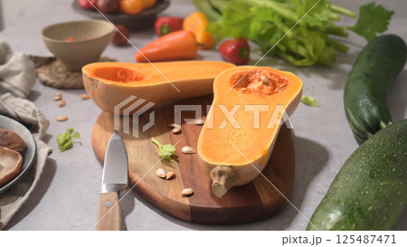 Autumn vegetables arranged on a kitchen worktop Autumn vegetables arranged on a kitchen worktop 125487471