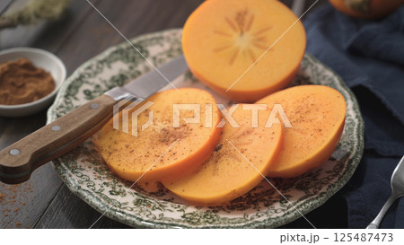 Orange persimmons 125487473